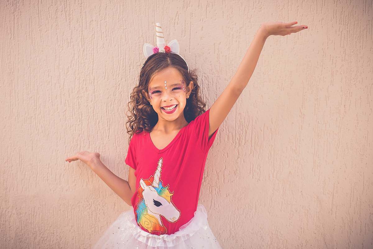 person girl wearing unicorn graphic tutu skirt human