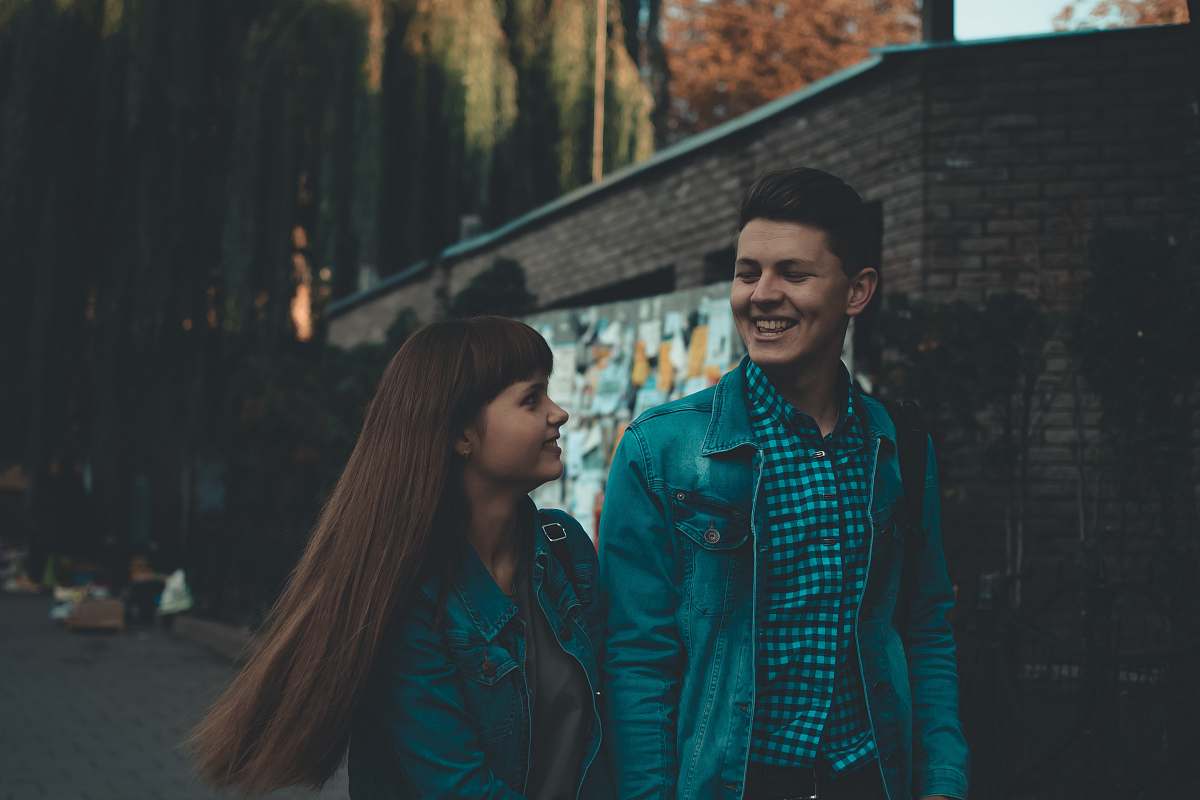 person man and woman walking with each other human