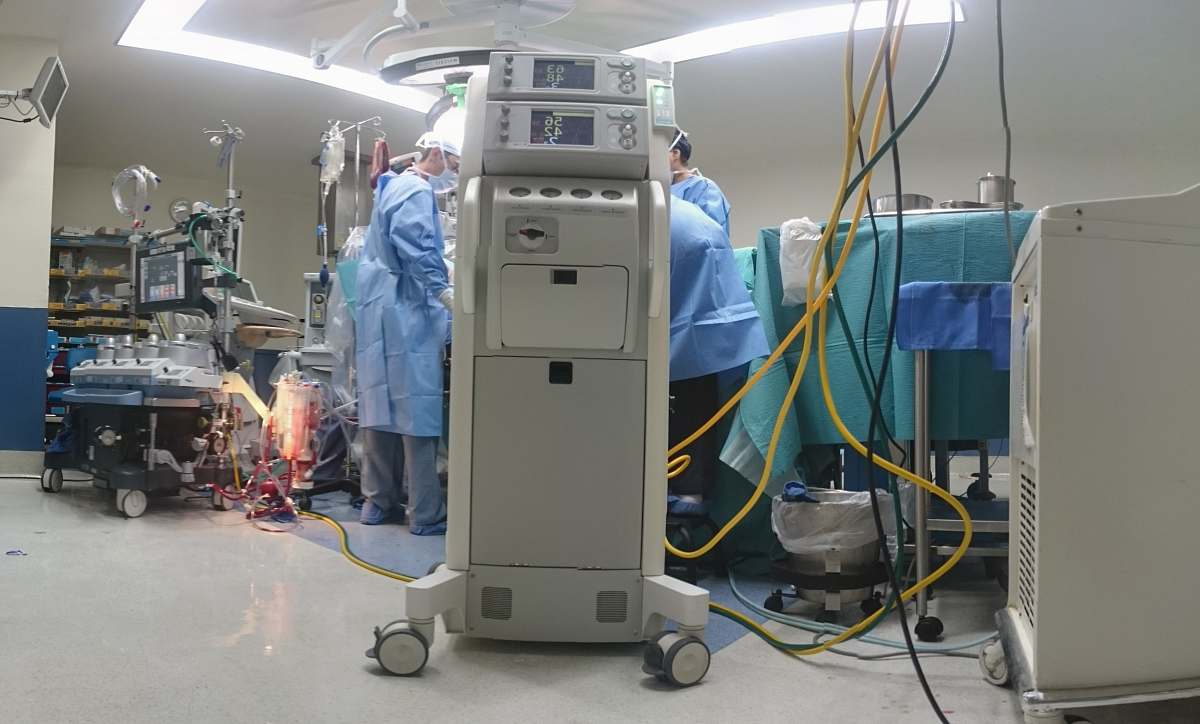 human room with people doing operation people