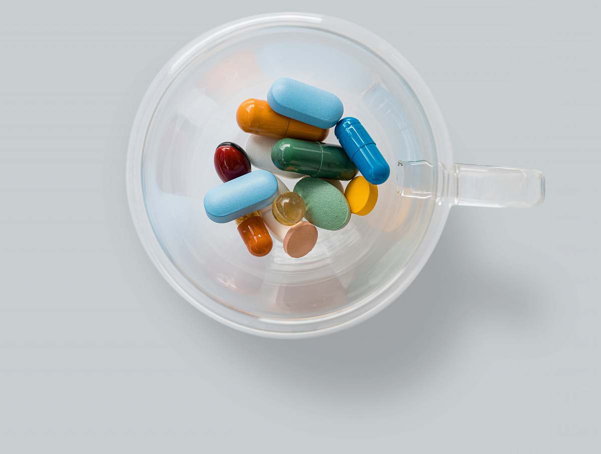 medication assorted capsules in mug warsaw