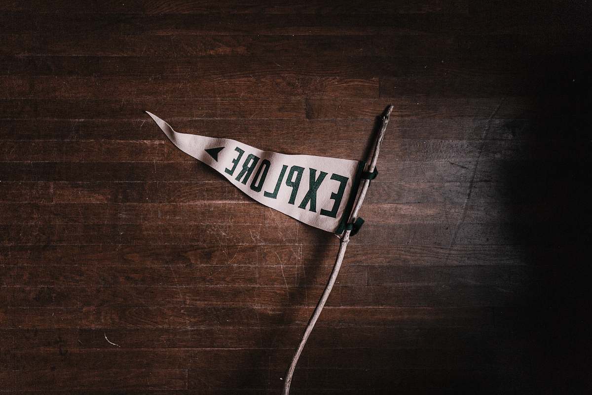 explore white Explore flag sign