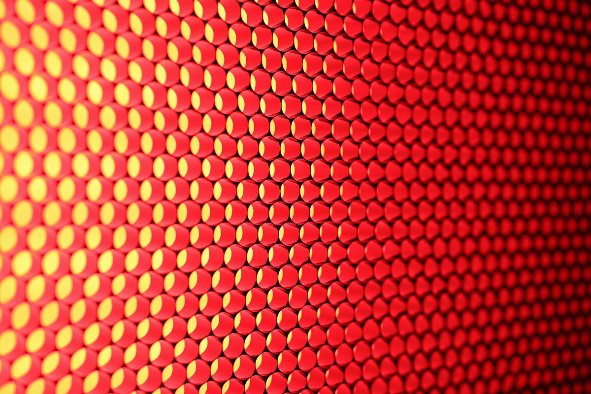 a red and yellow background with a pattern