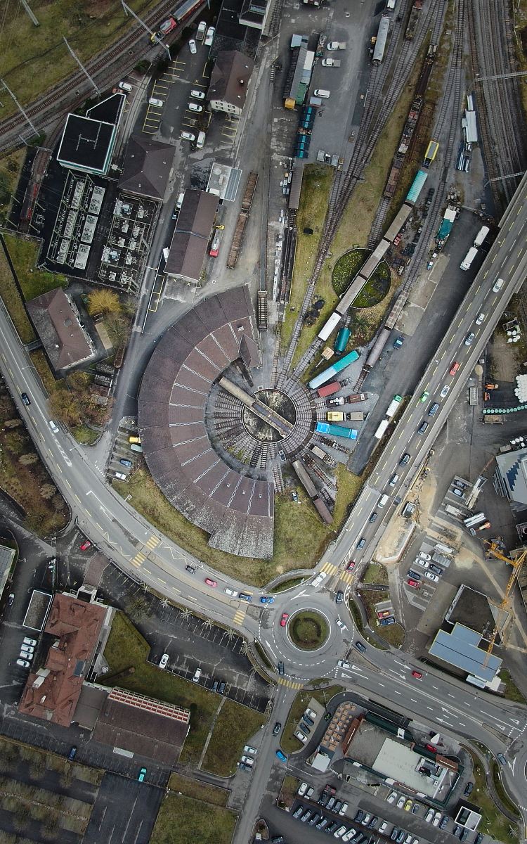 aerial photography of buildings, vehicles, and roads during daytime