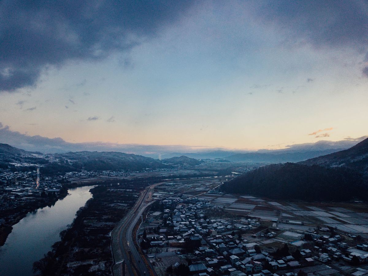 aerial view of houses and mountain