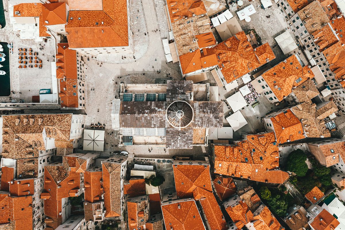 aerial view of houses with cathedral
