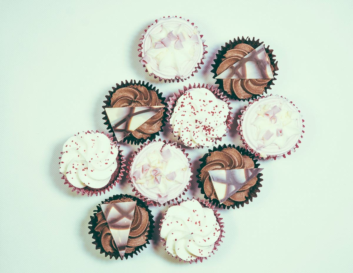 assorted cupcake lot on white surface