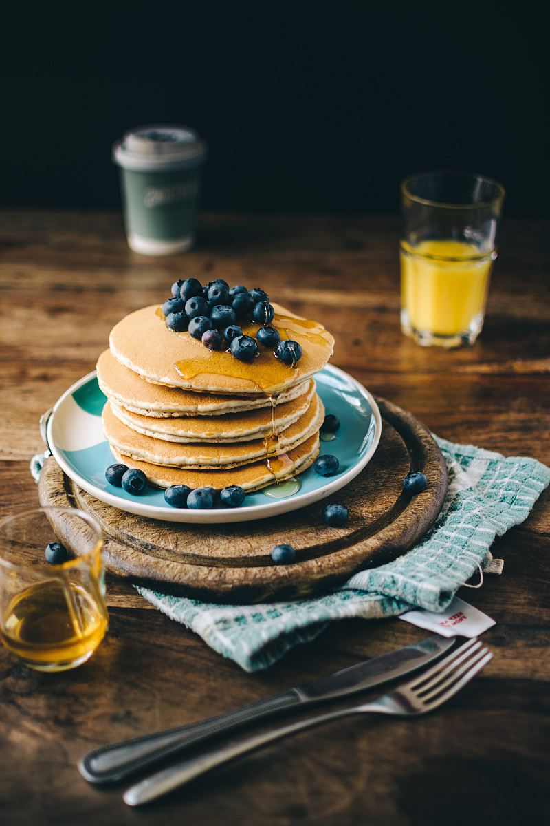 blue and white ceramic plate with pancakes