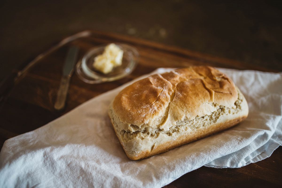 brown bread on white textile