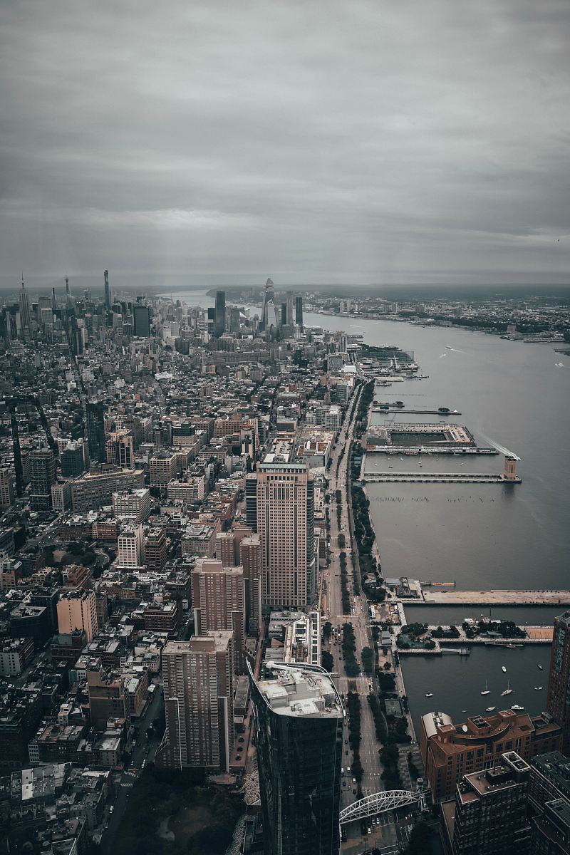 building lot near body of water during daytime aerial view photography