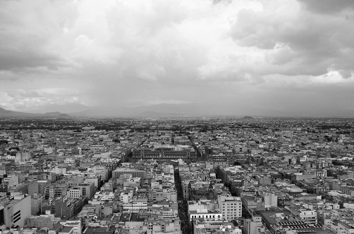grayscale photography of high rise buildings