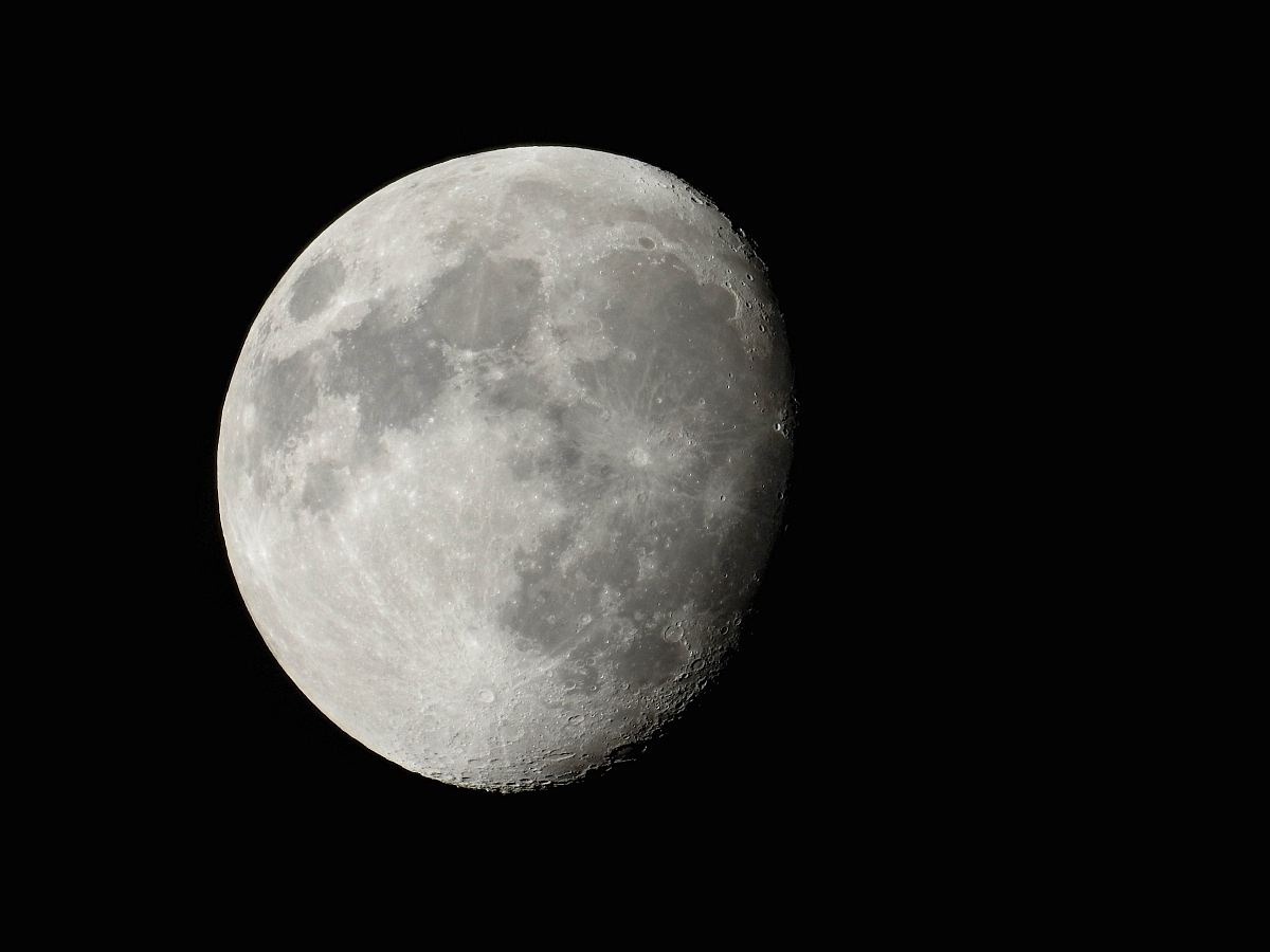 grayscale photography of quarter moon