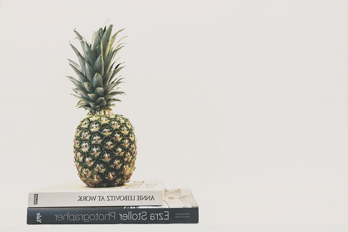 green and yellow pineapple fruit