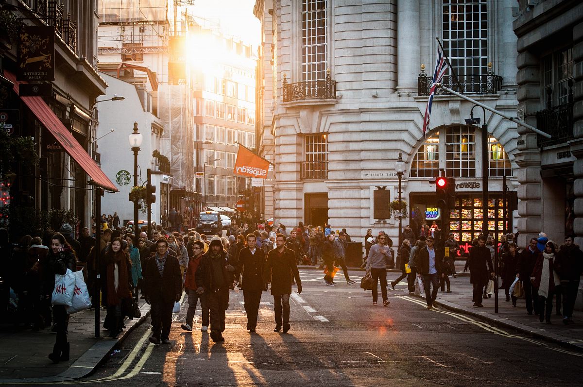 group of people standing at city