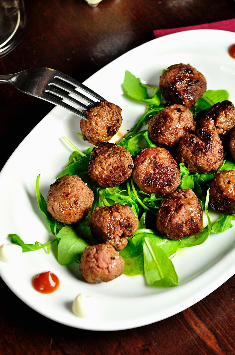 meat balls on oval white plate