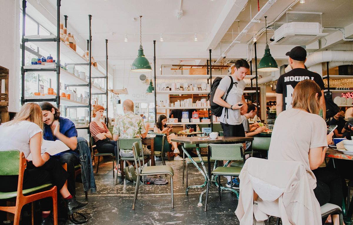 People Eating Inside Of Cafeteria During Daytime Image Free Photo