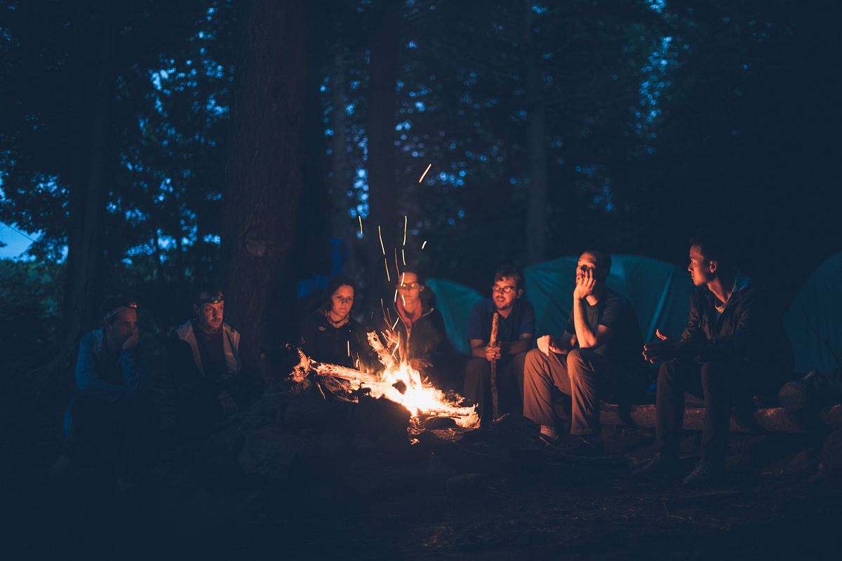 people having a bonfire