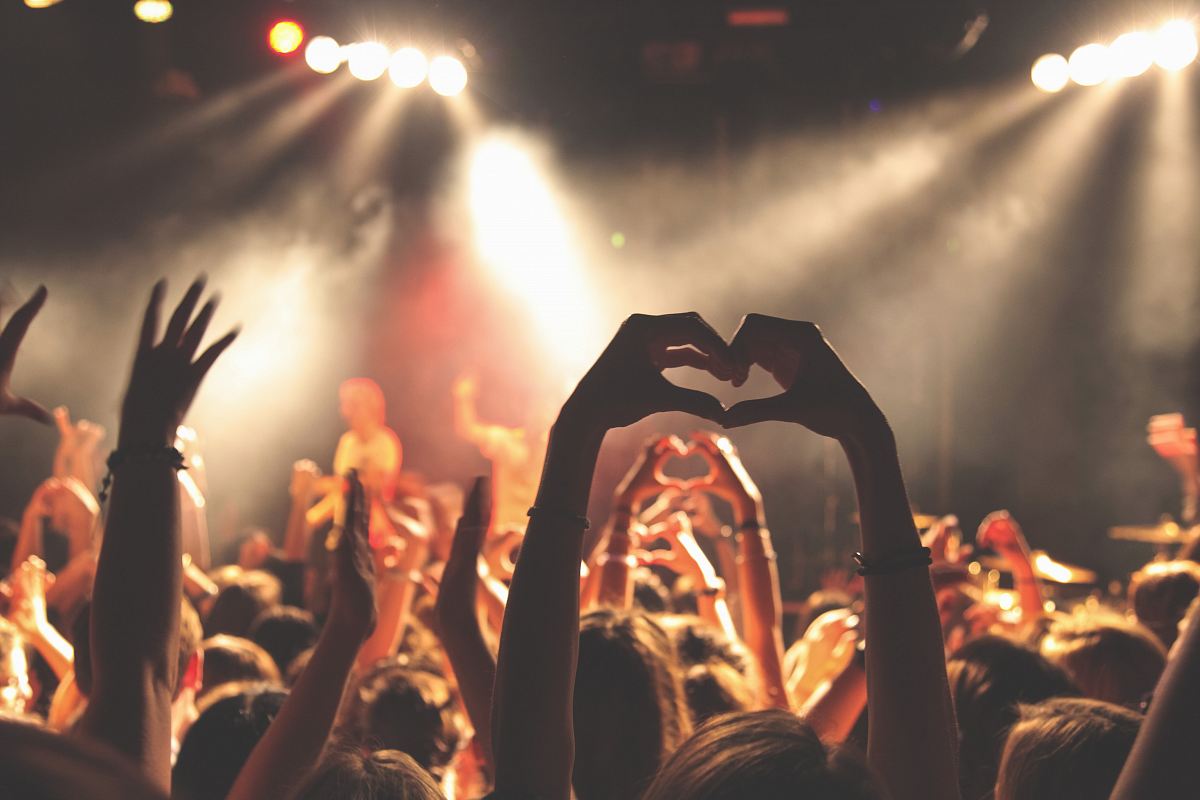 person performing heart hand gesture