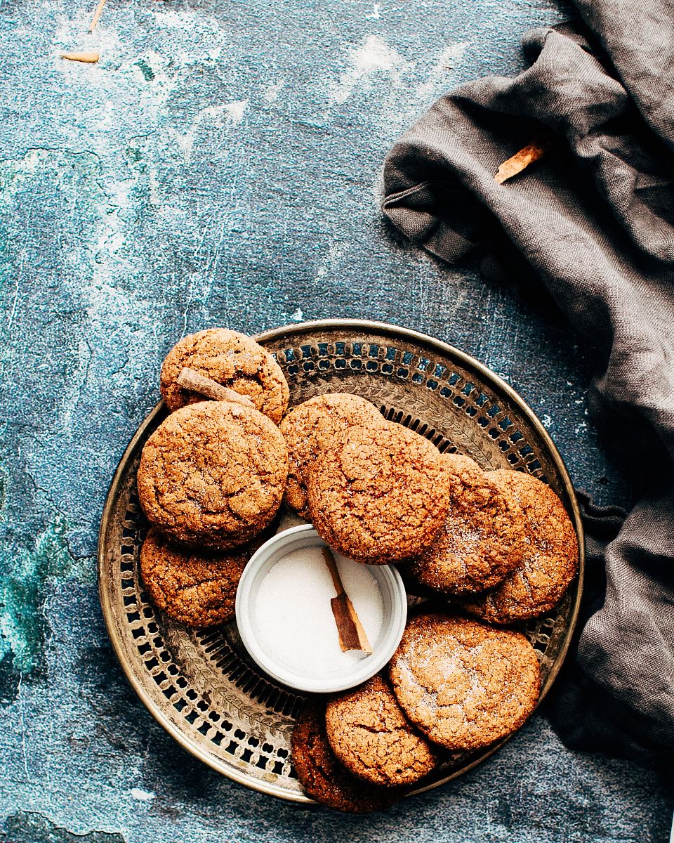 platter of cookies on top of blue surface