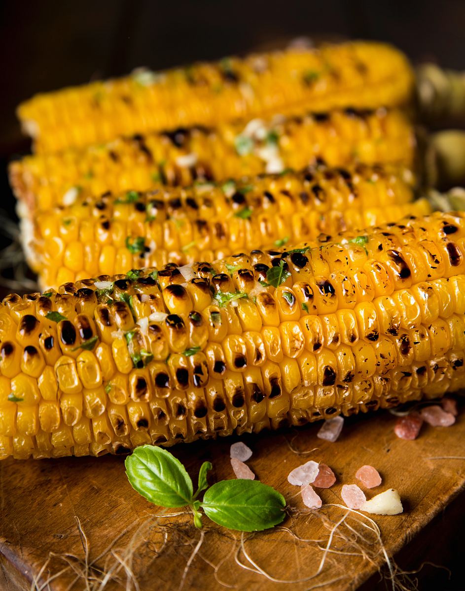 selective focus photography of grilled corns