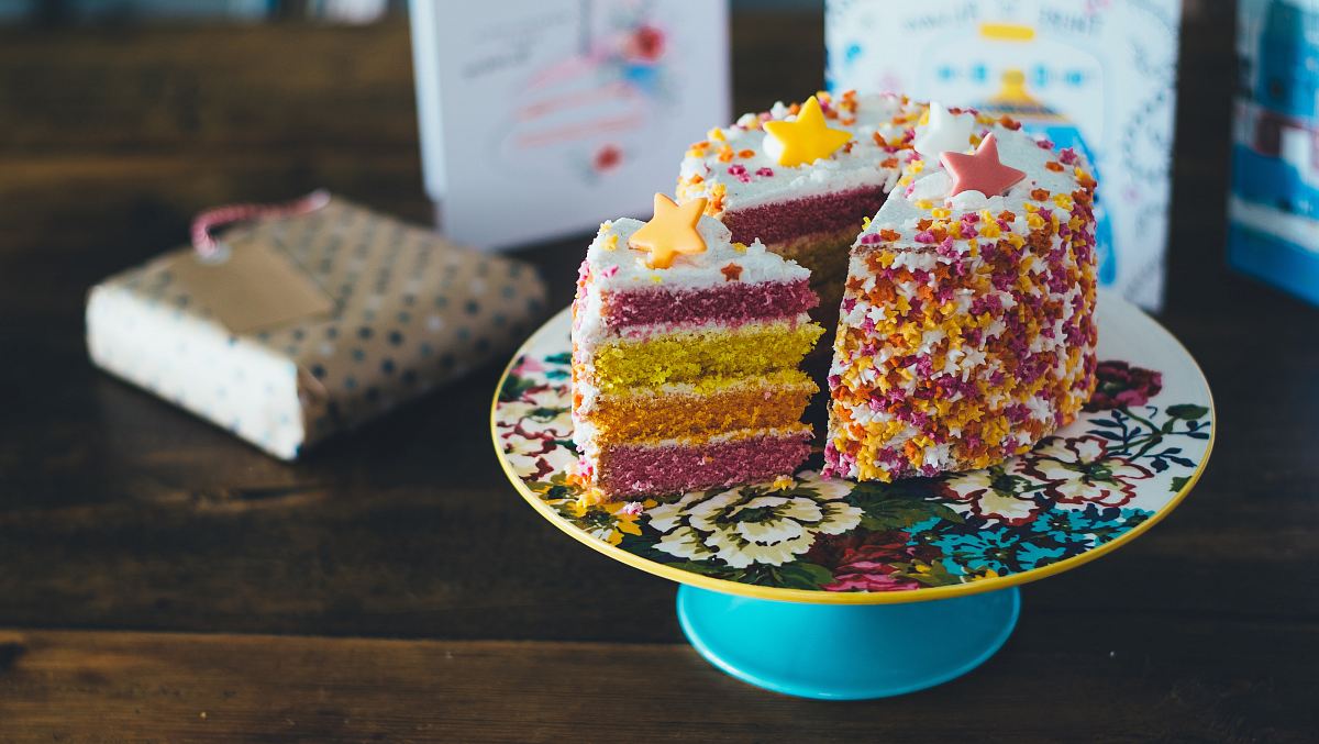 sliced cake on cake riser