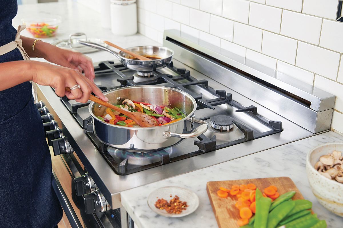 stainless steel and black gas range oven
