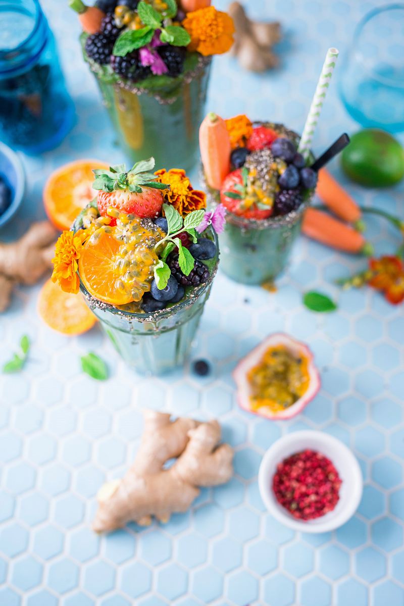 tilt shift lens photography of fruits in drinking glass