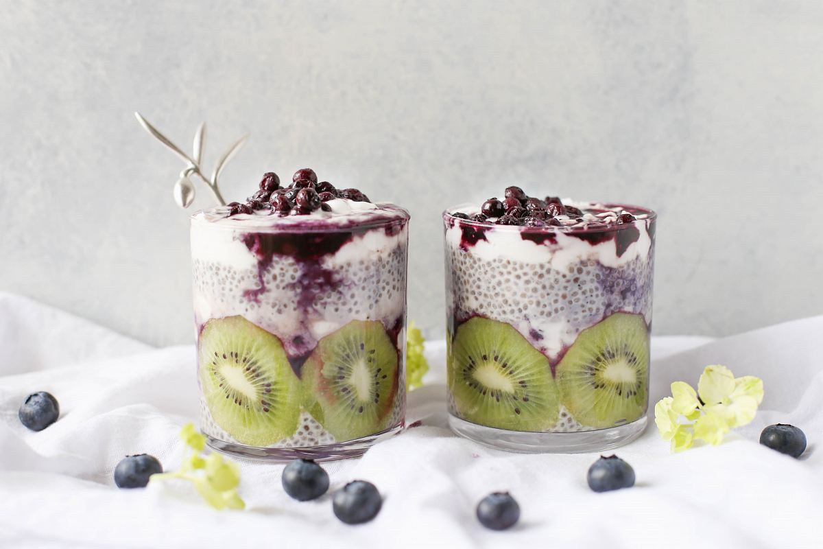 two fruit beverages on glass cups