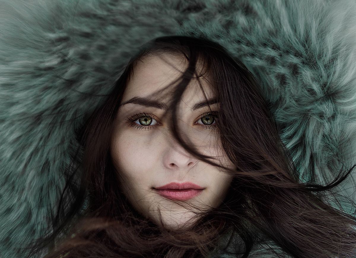 woman wearing fur hoodie