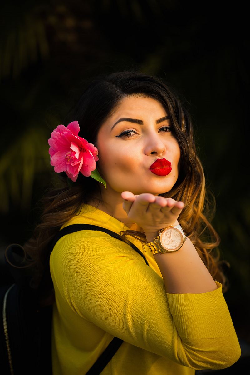 woman wearing yellow elbow-sleeved shirt