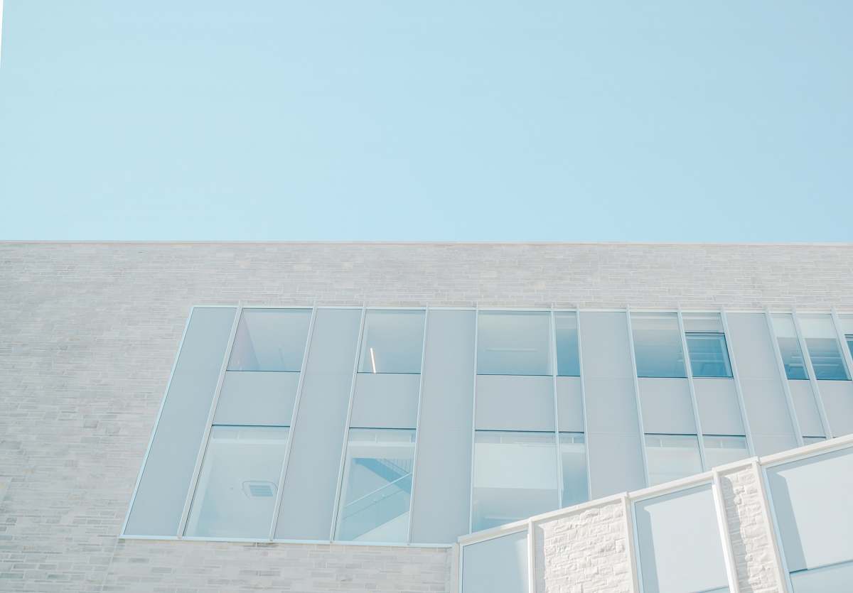 minimal A stairwell in a building seen through its windows window