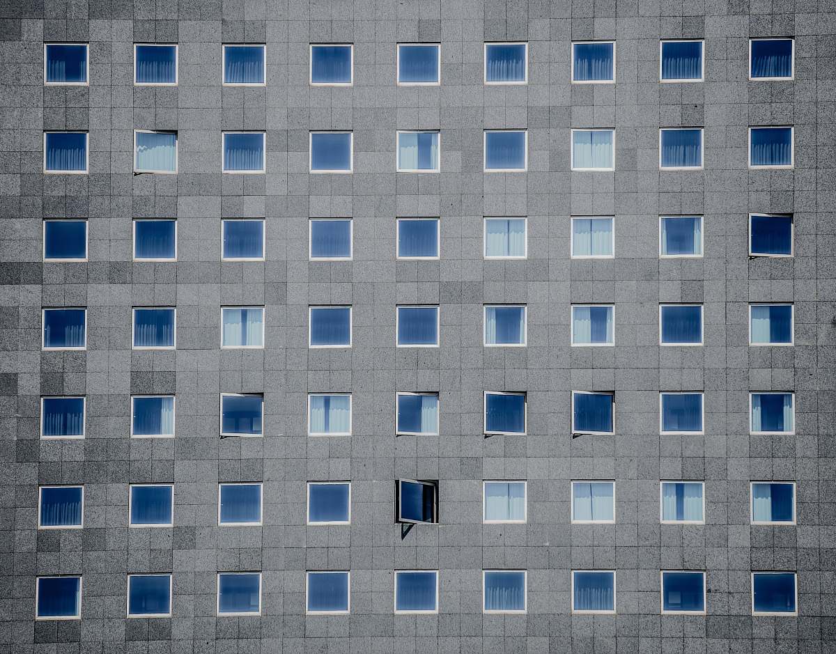 building gray concrete building photography pattern