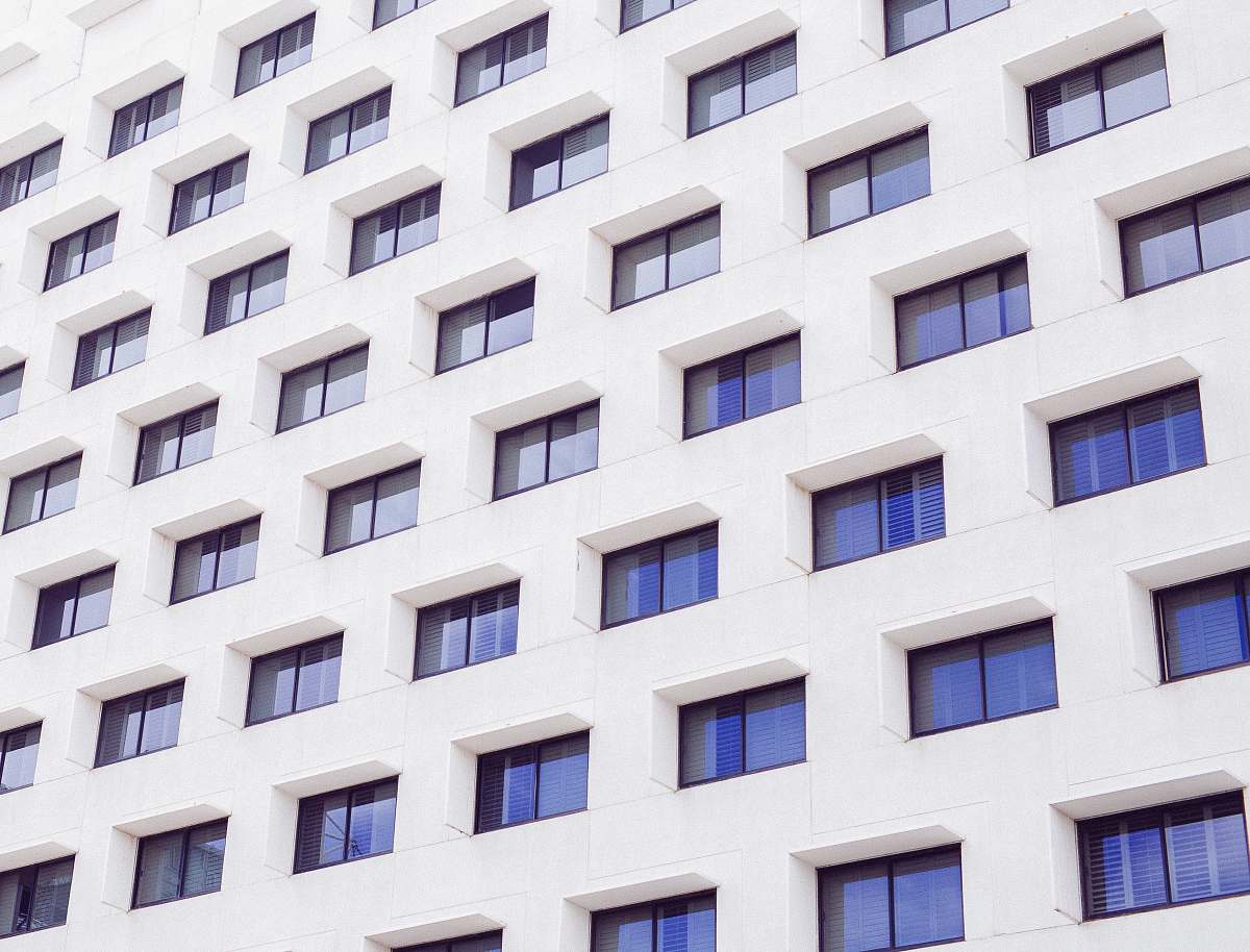 building white concrete building windows