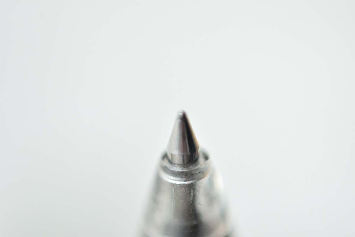 minimalist The tip of a pen. wallpaper