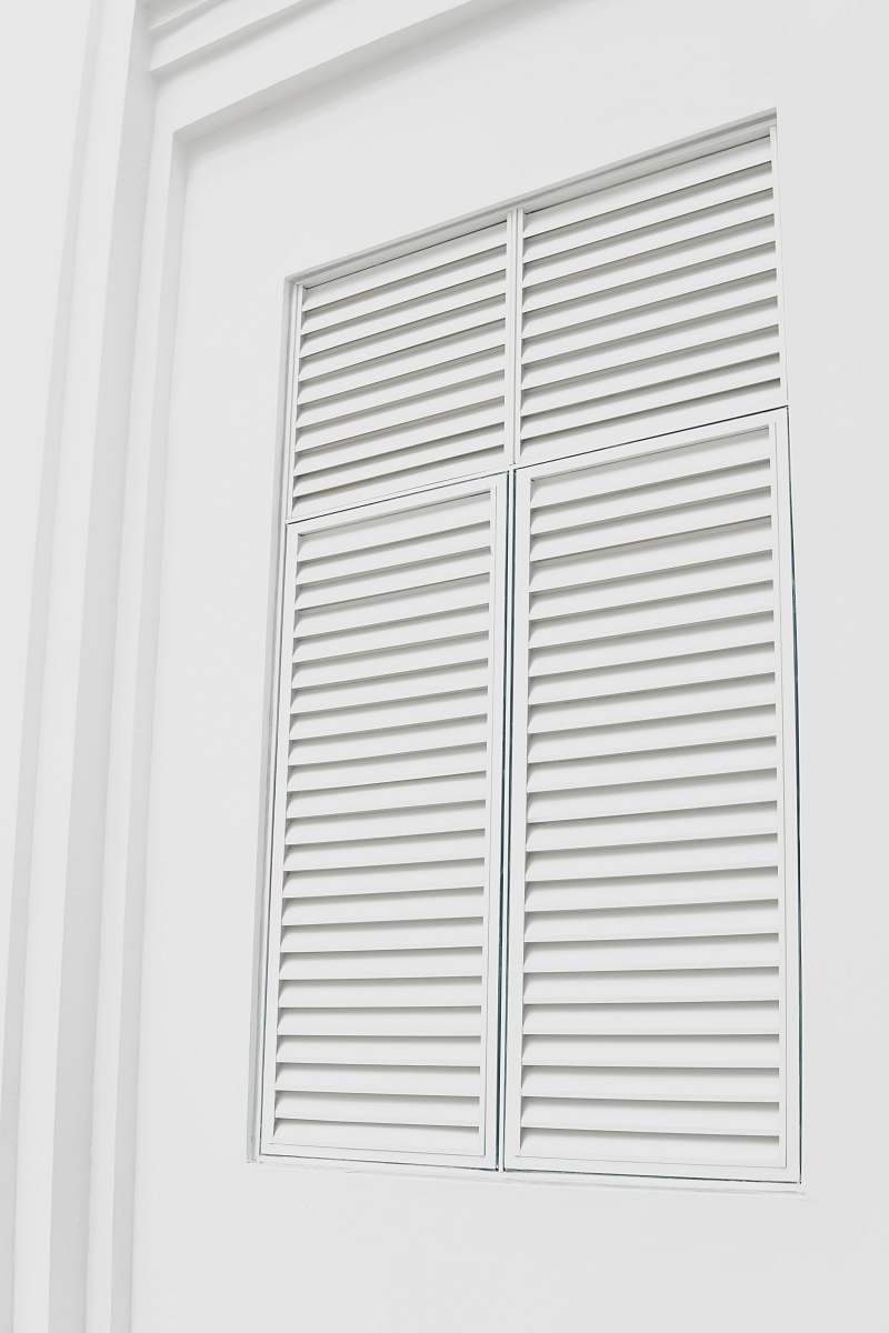 white white wooden louvered door grey