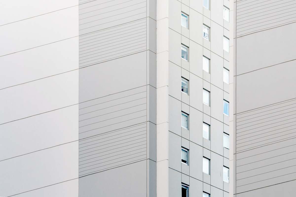 grey high-rise building housing