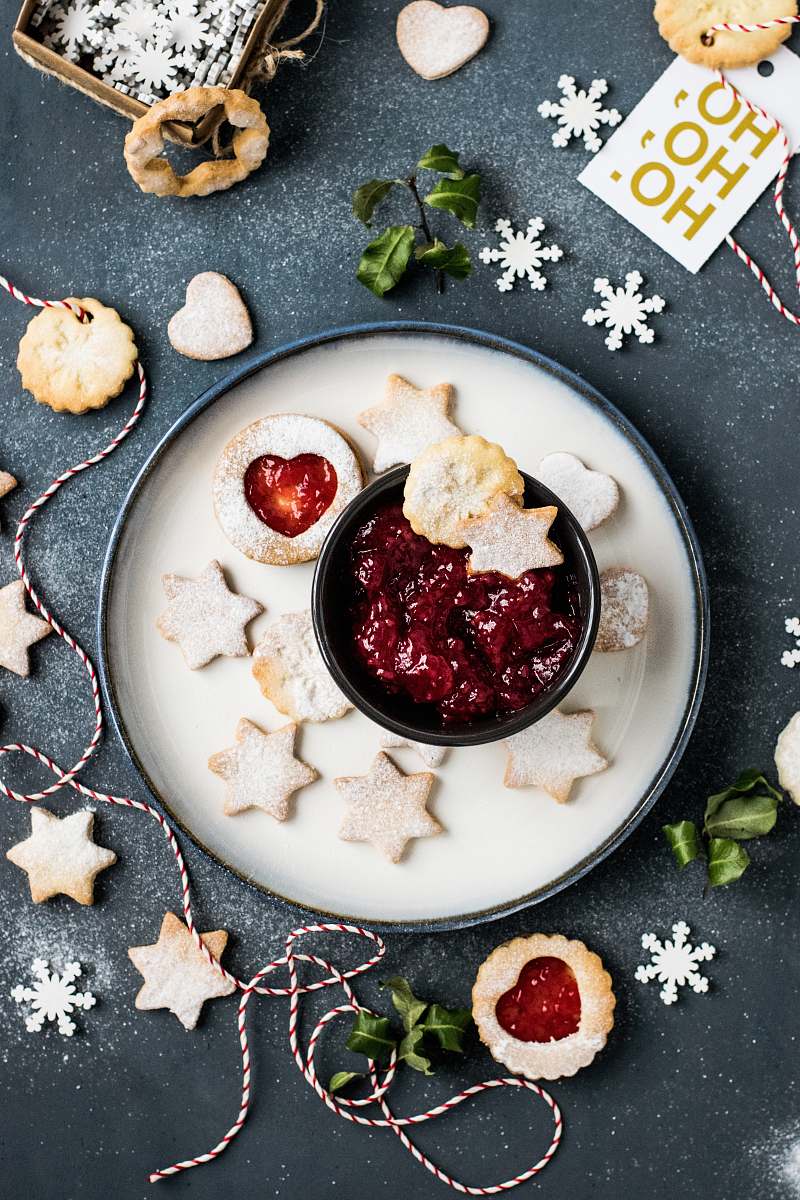 food strawberry jam with star biscuits on plate holiday