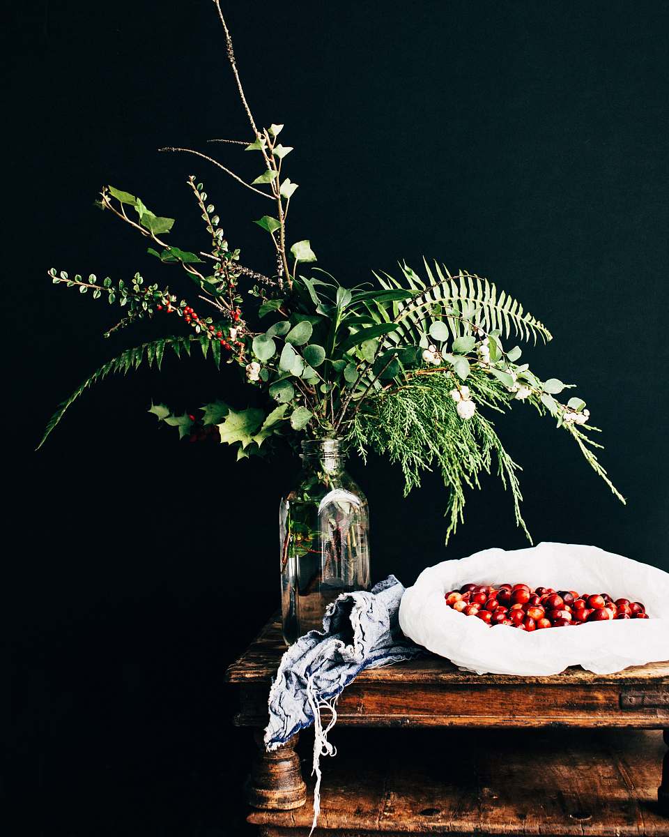 plant green leafed plant on clear glass bottle on top of table holiday
