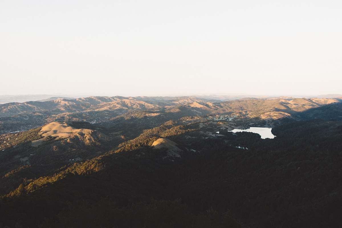 nature aerial view of hills during daytime crest