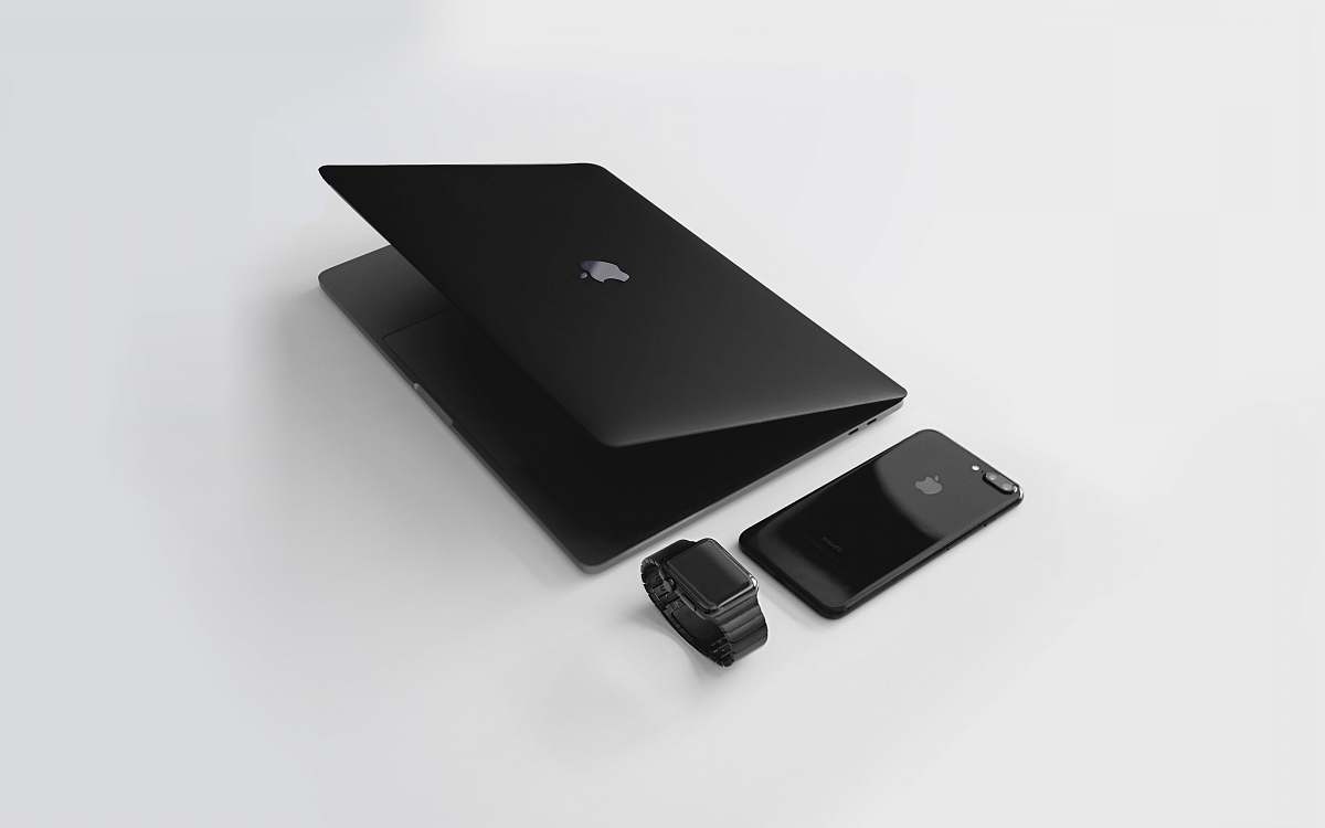 black-and-white black Macbook near black iPhone 7 Plus and black Apple Watch computer