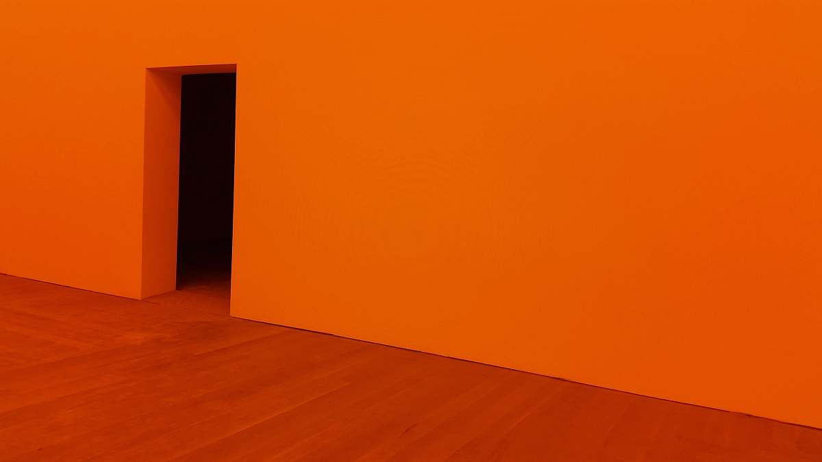 orange orange room with open door door