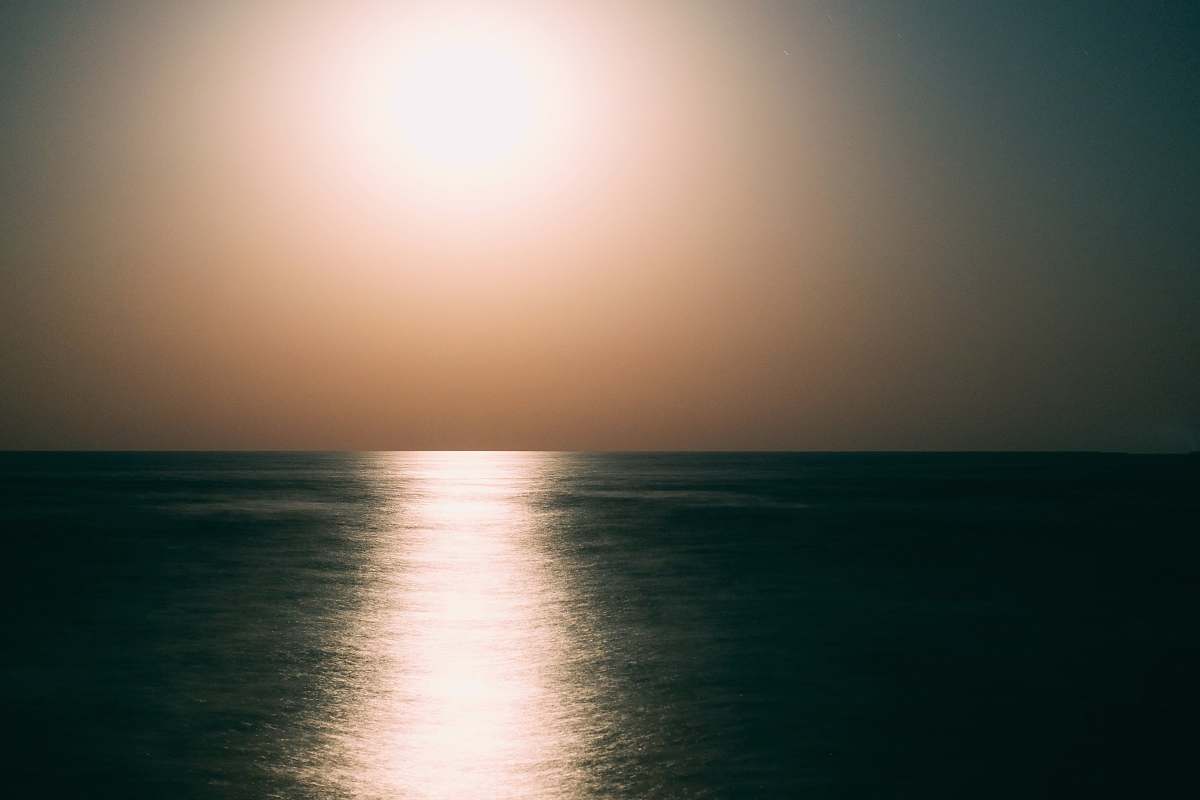 ocean calm body of water during day time sea
