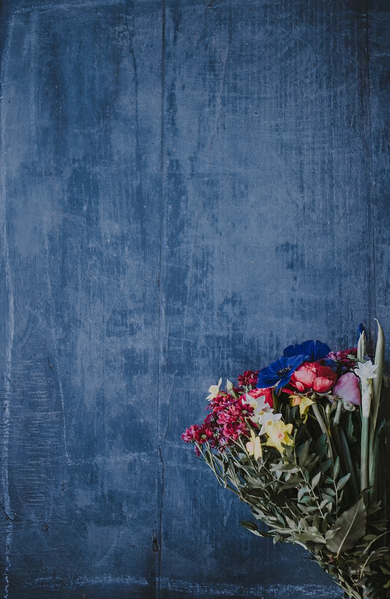 human gray and red flower bouquet person