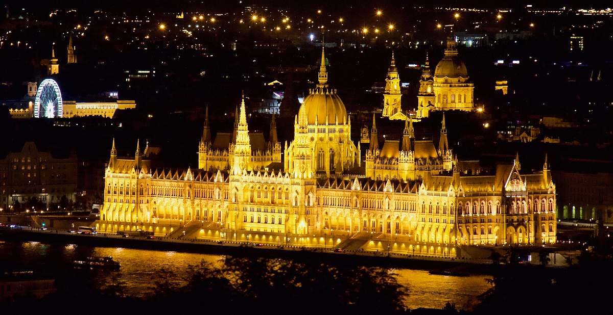 architecture yellow lighted building during daytime parliament