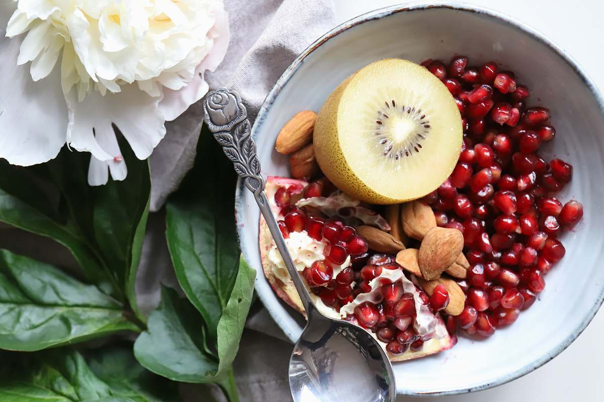 flower kiwi and peanuts on bowl fruit