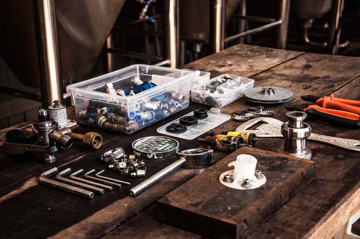 person flat lay photography of assorted-color mechanical tool set people