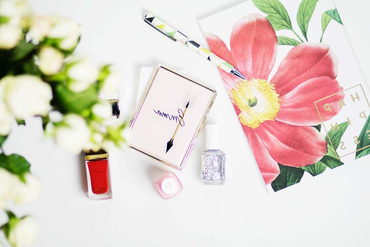 flower pink Emma box beside nail polish new york