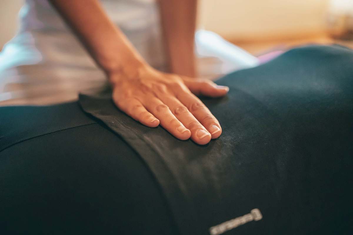 person person in black shirt with white manicure patient