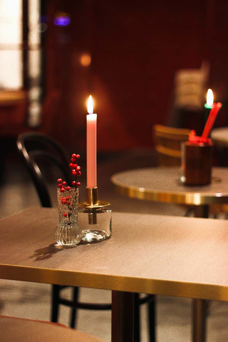 rotterdam lit candle stick on holder on table the netherlands