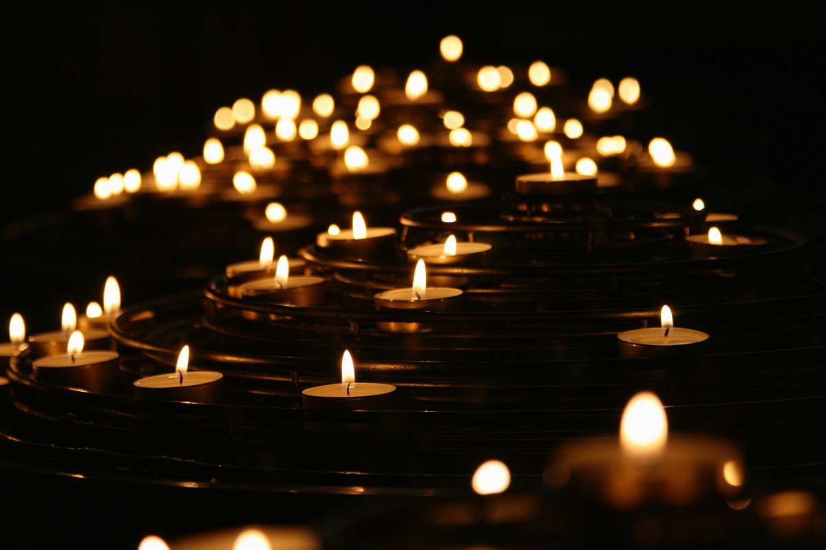light low-angle photo of lightened candles yoga