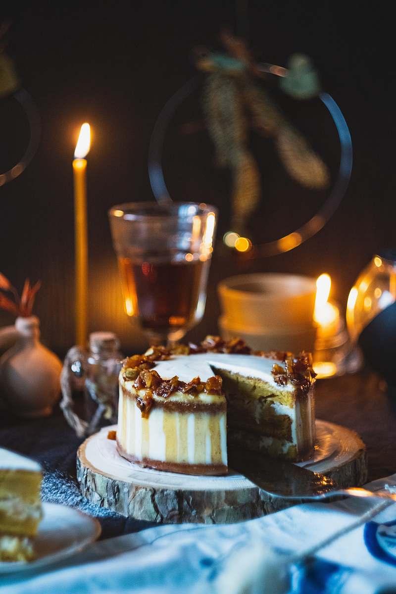 confectionery shallow focus photo of cake near lighted candle food